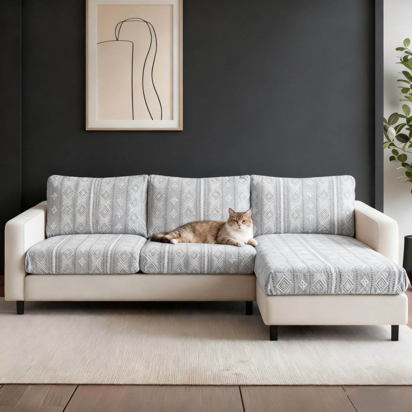 Luxury pet-proof sofa cover in a modern living room, protecting a gray couch with a sleeping cat. Stylish and durable fabric.